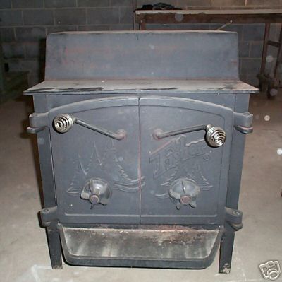 The double door Fisher Fireplace; this one was restored after years of neglect in an outbuilding.